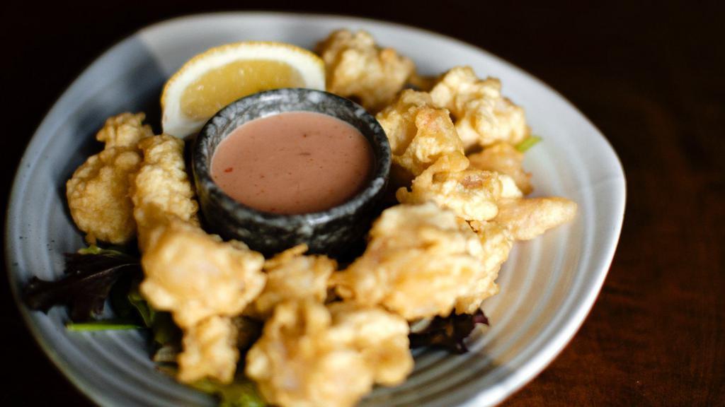 Jumpin' Shrimp · Doraku favorites. Tempura white shrimp and basil with a side of firecracker sauce.