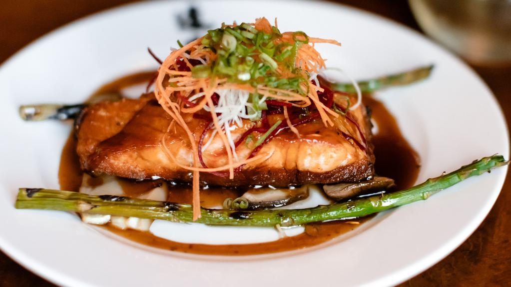 Pan Seared Salmon · Doraku favorites. Seared salmon served with asparagus and grilled Eryngii mushrooms topped with a lemon butter ponzu sauce.