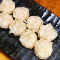 Shrimp Shumai · Pan-fried shrimp dumpling. 煎虾仁及蔬菜饺子。.