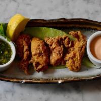 Buttermilk Fried Oysters · cornmeal, baby gem lettuce with cajun spices & cajun aioli. Contains shellfish.