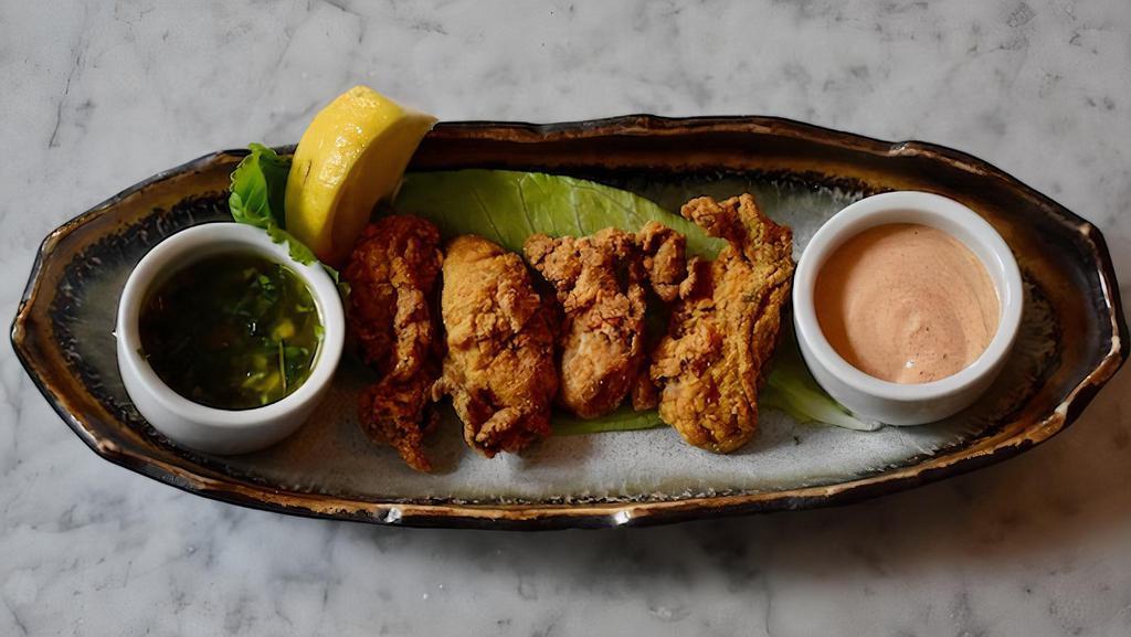Buttermilk Fried Oysters · cornmeal, baby gem lettuce with cajun spices & cajun aioli. Contains shellfish.