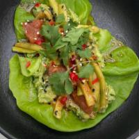 Tuna Tartare · Tuna tartare served over bibb lettuce with spicy avocado spread, Cucumber, Cilantro, Fresno ...