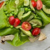 Spring Salad · Bibb lettuce, Green Peas, Grilled Artichoke, cucumbers, shaved carrots, cherry tomatoes and ...