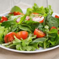 Garden Salad · Fresh romaine lettuce, juicy tomatoes, carrots cucumbers and red cabbage, served with your c...
