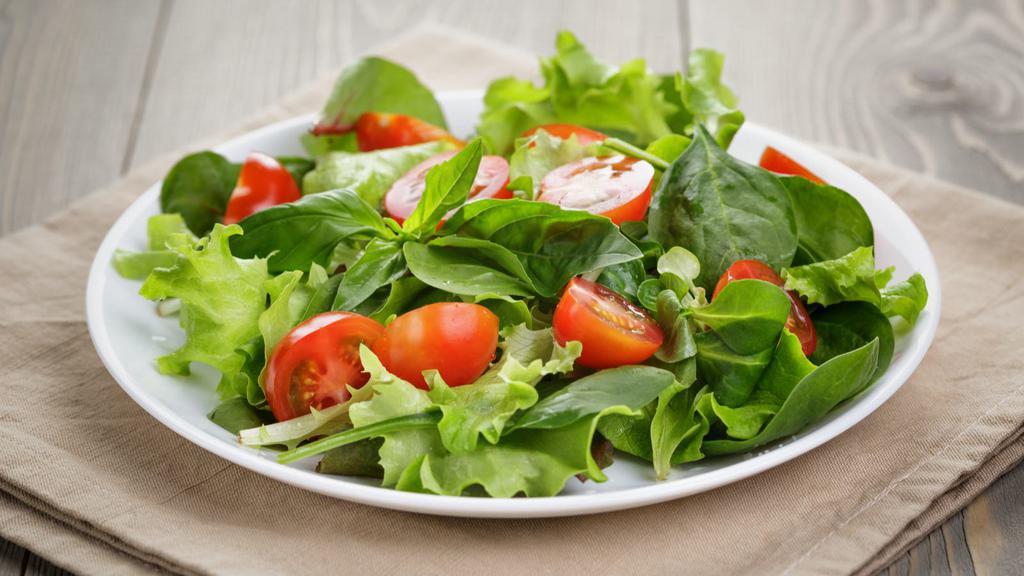 Garden Salad · Lettuce, carrots, tomatoes, cucumbers, and onions with your choice of dressing.