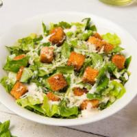 Caesar Salad · Crispy romaine, fresh grilled chicken, croutons, and grated Parmigiano cheese with your choi...