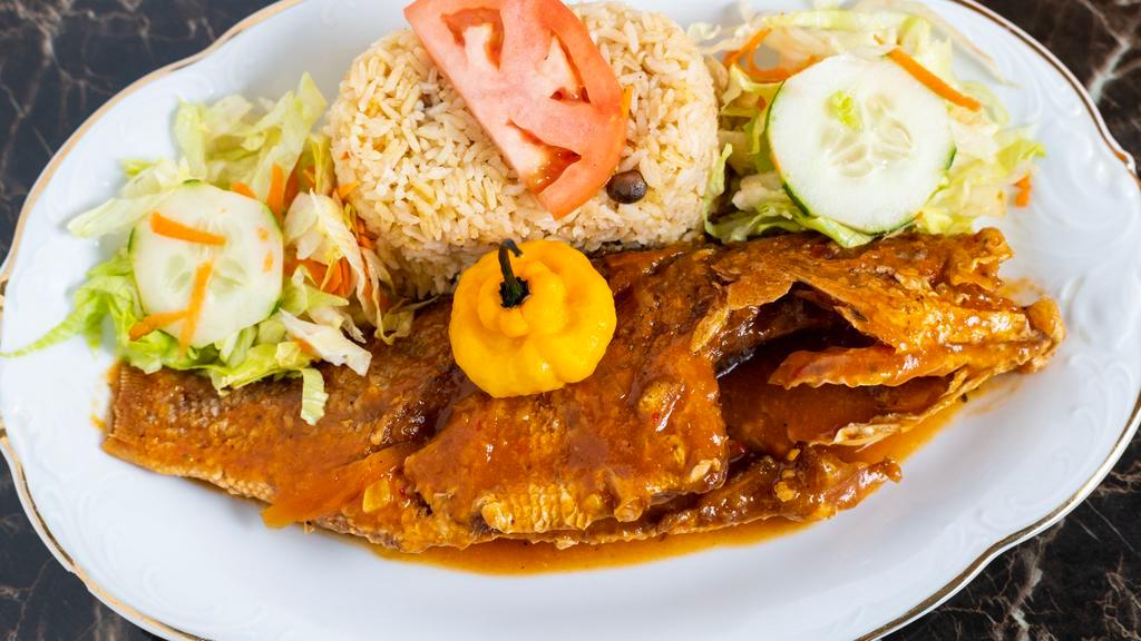 Brown Stew Snapper · Fried whole fish cook in fresh herbs and spices. Fifteen - twenty minutes to prepare.