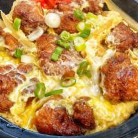 Oyakodon (Karaage Version) · Fried chicken pieces and egg bath over rice.