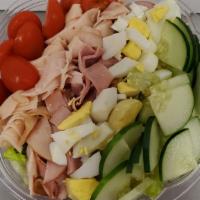 Loaded Salad · Chopped salad with sliced chicken, ham, turkey, hard-boiled egg, cucumbers, tomatoes, crouto...