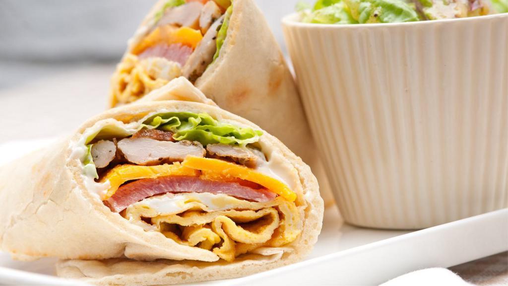 Ham Wrap · Three eggs, ham, American cheese, and mayo or ketchup.