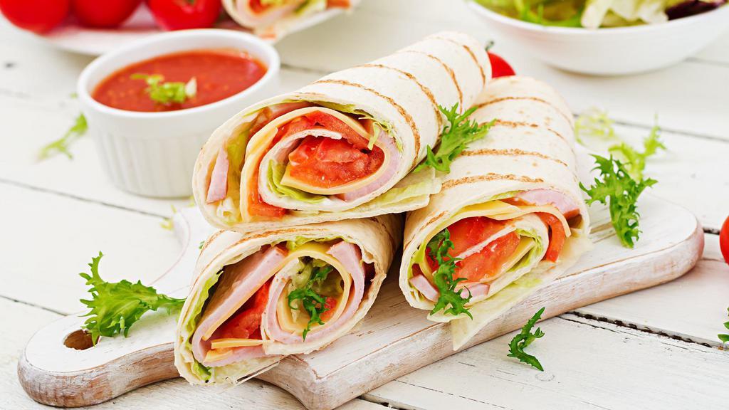 Healthy Two Wrap · 3 eggs white, ham or bacon, cheese, avocado, home fries & chipotle mayo.