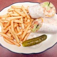 Chicken Salad Club · Served with lettuce, tomato, sliced hard boiled egg, pickle, coleslaw and fries.