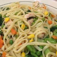 Chicken Primavera · Grilled chicken with sauteed vegetables in garlic and olive oil over linguini. Served with a...