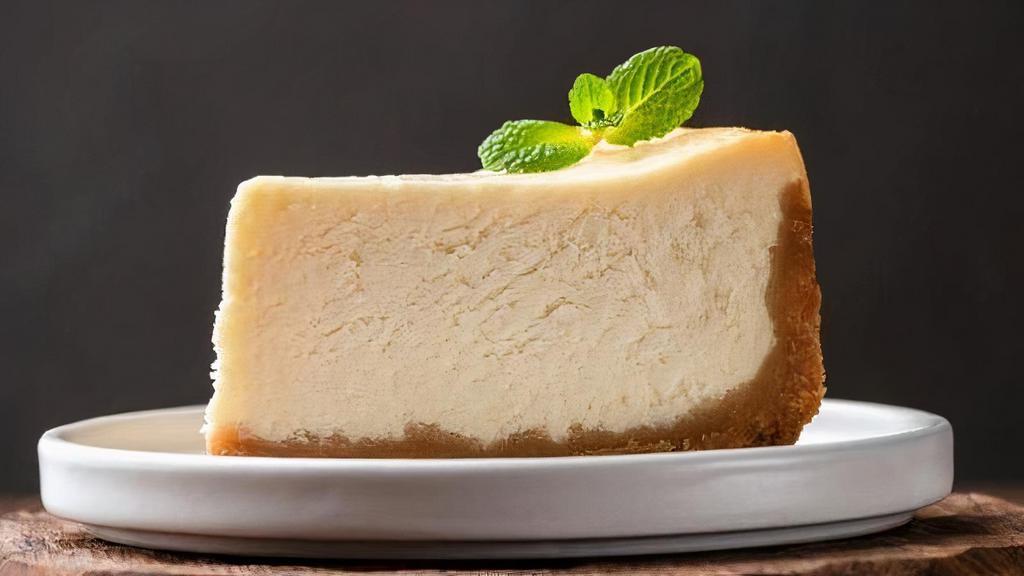 New York Cheese Cake · A RICH CREAMY AUTHENTIC NEW YORK STYLE CHEESE CAKE MADE WITH ONLY THE FINEST INGREDIENTS BAKED SLOWLY TO PERFECTION