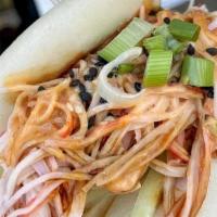 Krabby Patty Bao Buns · Kani Salad | Julienne Cucumber | Avocado | Sriracha Aioli | Sweet Teriyaki | Sesame Seeds | ...