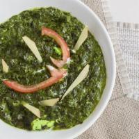 Palak Paneer · Cottage cheese in creamy spinach based sauce.