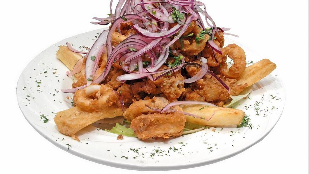 Jalea · Crispy Fried Fish, Shrimp, Calamari and Cassava, Topped with Peruvian Creole Salad.