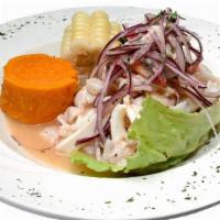 Ceviche Mixto · Calamari, Shrimp, and Diced Fish Marinated in Lime Juice and Onions, Served with Peruvian Co...