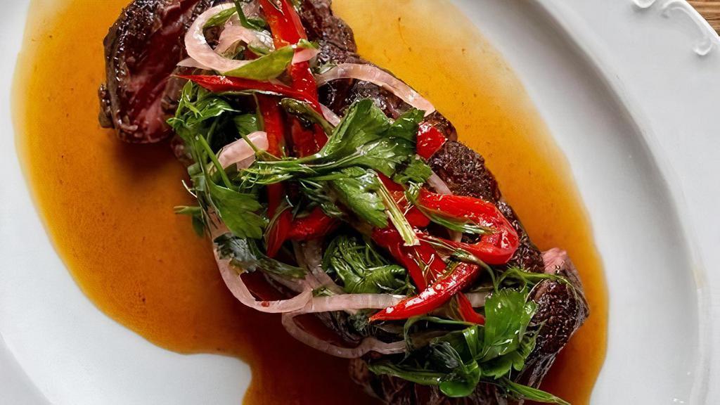 Seared Hanger Steak · pickled fresno & herb salad