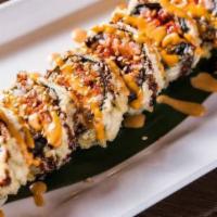 Volcano Roll · Spicy tuna , avocado whole roll deep fried with spicy mayo eel sauce on top.