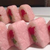 Tiger Roll · Tuna, salmon, white tuna, avocado, and spicy tempura with green soy bean paper.