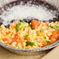 Huevos A La Mexicana · Spicy. Scrambled eggs with chopped onions, fresh jalapenos and tomatoes, served with black r...