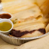 Veggie Tamales · Two tamales with green peppers and onions. Handmade and wrapped in corn husk.