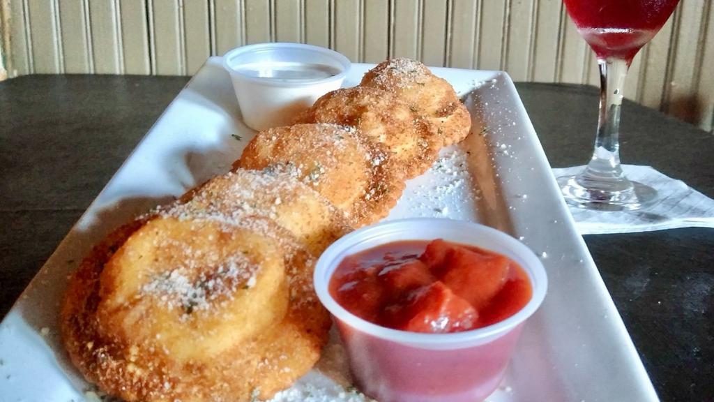 Toasted Cheese Ravioli · Crispy, breaded ravioli filled with cheese.  Served with fresh tomato sauce and ranch dressing for dipping!