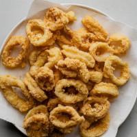 Crispy Calamari · Tender calamari in a crispy, spicy breading.  Served with our fresh-made tomato sauce for di...