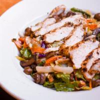 Warehouse Salad · Herb-marinated fresh grilled chicken breast, smoky bacon, pepperoni, sauteed mushrooms, blue...