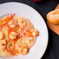Shrimp Scampi · Jumbo shrimp sauteed with garlic, butter, white wine, onion and red peppers served over ange...