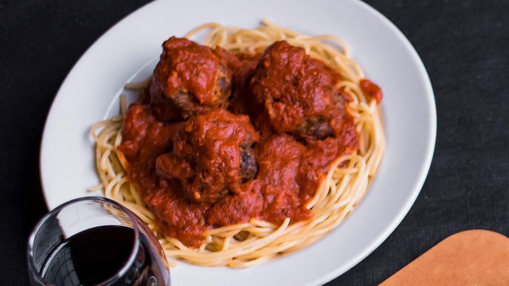 Spaghetti & Meatballs · Spaghetti topped with hand-rolled beef and pork meatballs and covered with more made-from-scratch tomato sauce.  Served with fresh bread and a choice of a soup or a salad.  Gluten free spaghetti upon request.