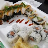 White Dragon Roll Special · Eel, avocado, cucumber, fully topped with white tuna, and green onion with eel sauce on top.