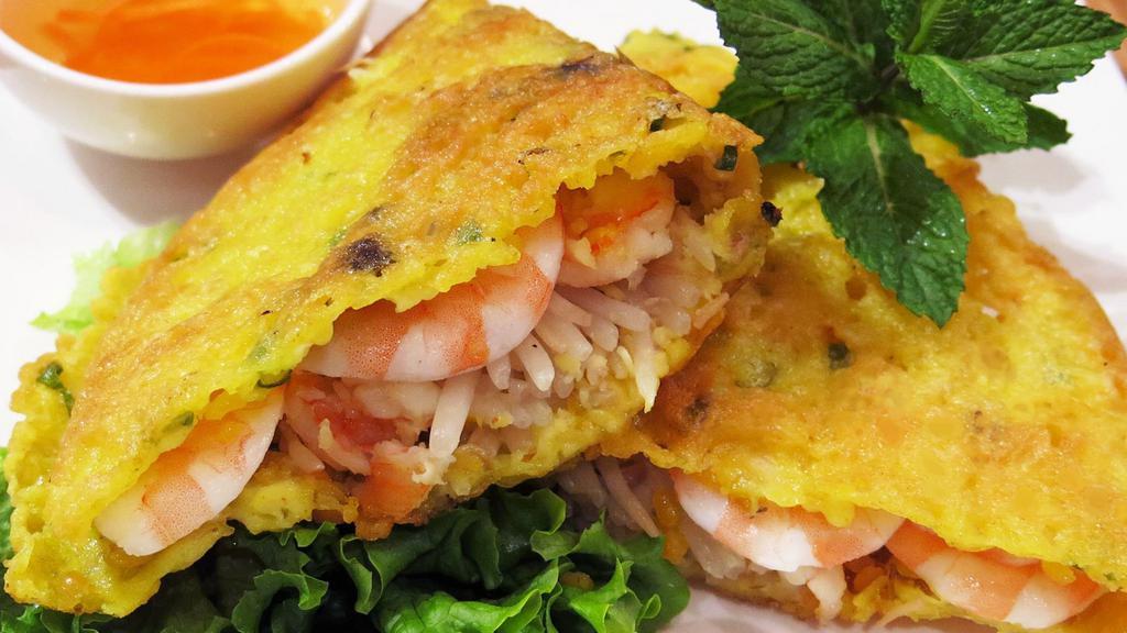 Vietnamese Style Pancake (Banh Xeo) · Crispy rice pancake stuffed with pork, shrimp, onion, bean sprout, and mung bean.