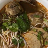 Bun Bo Hue · Spicy. Spicy beef & pork noodle soup. Served with beef flank and condensed pig blood cubes i...