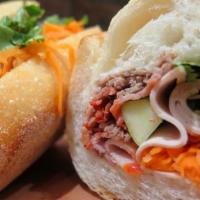 Vietnamese Sandwich · Roasted barbecue pork, Vietnamese sausage, pate, mayonnaise, pickled carrots, cilantro, and ...