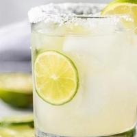 Hangar Margarita · Tequila, triple sec, lime juice, sour mix  and club soda.