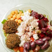 Salad Bowl · Baby arugula, israeli chopped salad, feta cheese, kalamta olives, marinated beets, chickpeas...