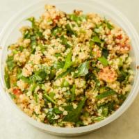 Quinoa Tabouli Salad · Quinoa with chopped tomatoes, French mint and parsley with lemon juice and extra virgin oliv...