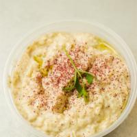 (Catering) Baba Ganoush · Fire-roasted eggplants mixed with our homemade tahini. Serves 15-18 people.