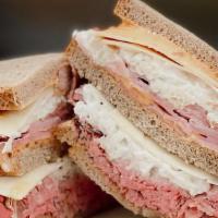 Sloppy Joes Sandwich · Ham, roast beef, cole slaw and swiss on rye bread with russian dressing.
