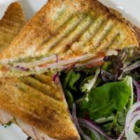 Turkey Guacamole · Turkey, guacamole and swiss on toasted sourdough, served with salad.