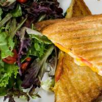 Grilled Cheese · Cheddar and swiss on sourdough, served with salad.