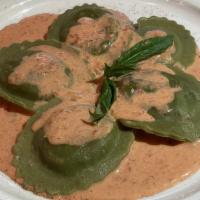 Ravioli Alla Vodka · Spinach ravioli stuffed with ricotta cheese in tomato “pink” sauce.
