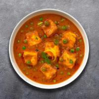 Mattar Motive Paneer · Cubes of fresh cottage cheese and green peas cooked in a creamy tomato gravy.