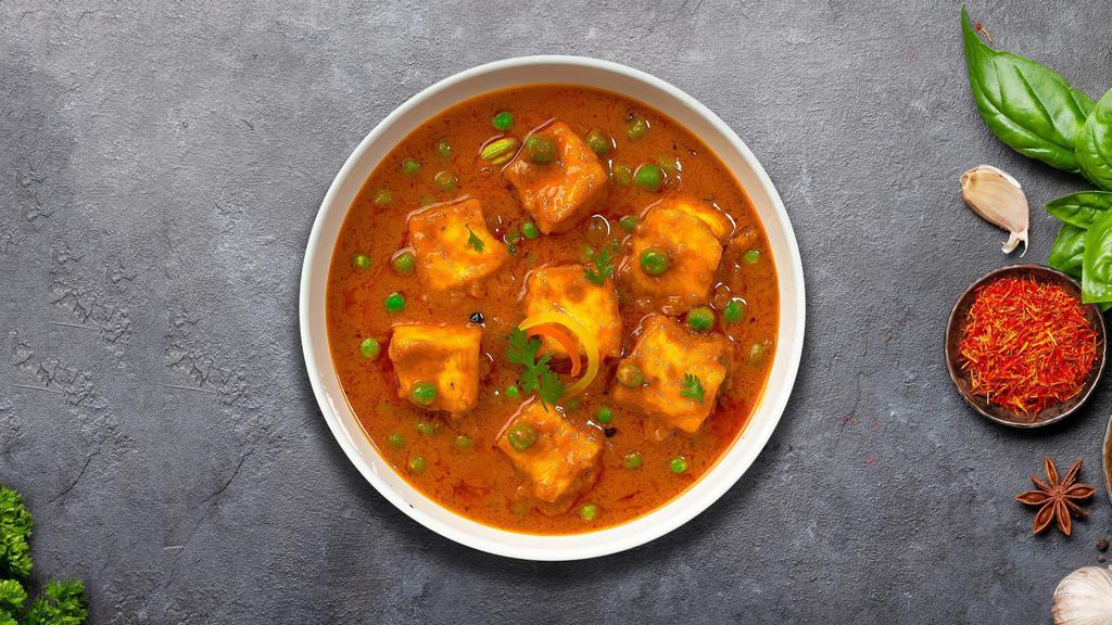 Mattar Motive Paneer · Cubes of fresh cottage cheese and green peas cooked in a creamy tomato gravy.