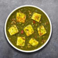 Shining In Saag Paneer · Cubes of fresh cottage cheese cooked in a spinach gravy infused with garlic, ginge, and spic...