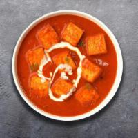 Purely Paneer Makhani · Cubes of fresh cottage cheese cooked in a creamy butter tomato gravy