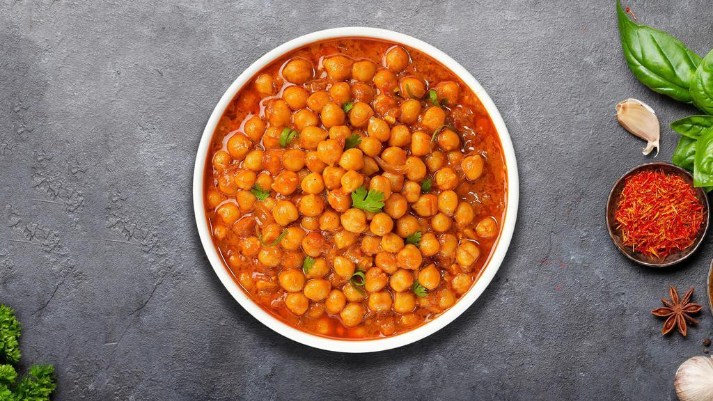 Chana Masala Chaser · Chickpeas cooked in a tomato and onion gravy with Indian spices.