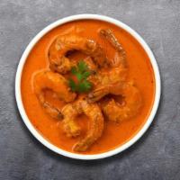 Shrimply Goan Curry · Fresh shrimp cooked in a tomato based onion gravy with ground spices